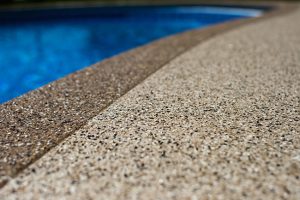 Keep Your Swimming Area Watertight with a Concrete Pool Coating